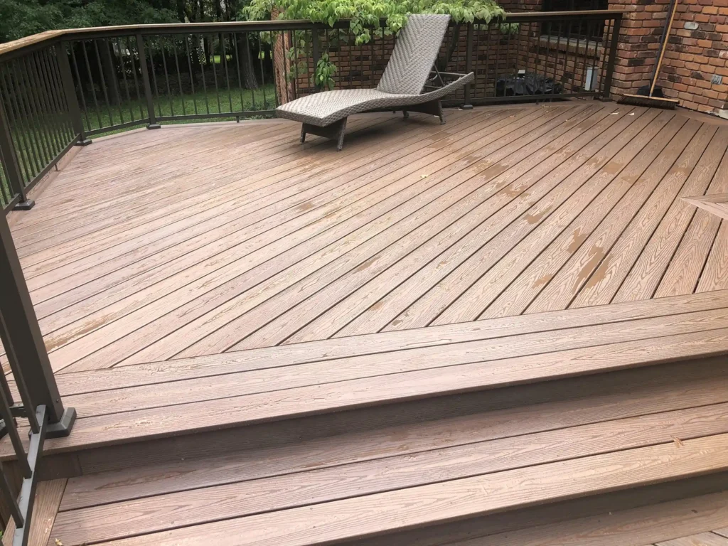 Composite vs wood decking - Photo of a composite deck that looks like wood - Composite decking vs wood decking